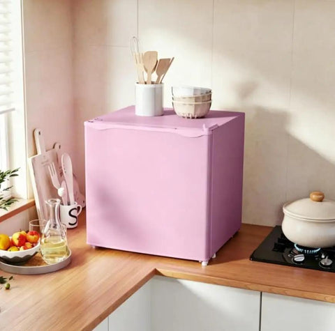 Pink Countertop Mini Freezer 1.1 Cubic Feet Compact Upright Quick Chill No Fuss Energy Saver Straight Up Quiet Operation in kitchen.