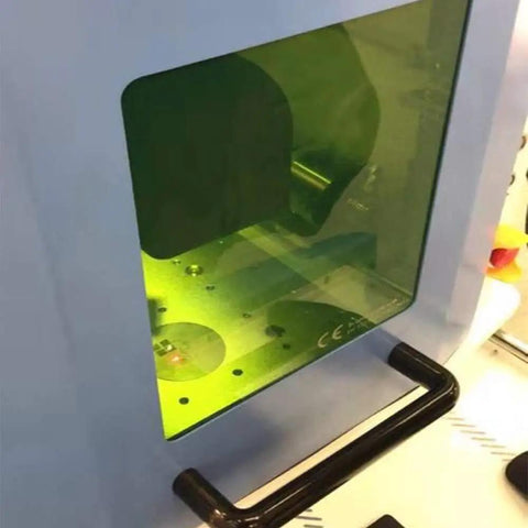 Top Drawer 1064nm Laser Safety Protection Window Heavy Duty Optical Viewer with green tint and ergonomic handle for workstation use.