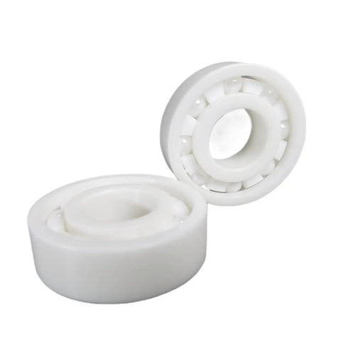 Heavy Duty Ball Bearing 5 Pack For Motors And Mowers Precision Ground For Smooth Quiet Spinning Reduces Shake And Wear Offers Rock Solid Durability that displays two precision white ball bearings.