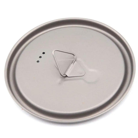 Ultralight Titanium 750ml Camp Pot lid with handle, ideal for solo hikes, bikepacking, and minimalist backpacking