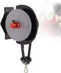Badass Wall Mounted Flywheel Trainer Featuring Adjustable Resistance Belt For Home Gym Strength Training and Versatile Full Body Arm Leg Workout Station To Shred Fat Fast While Building Lean Muscle Mass, showing flywheel with resistance belt.
