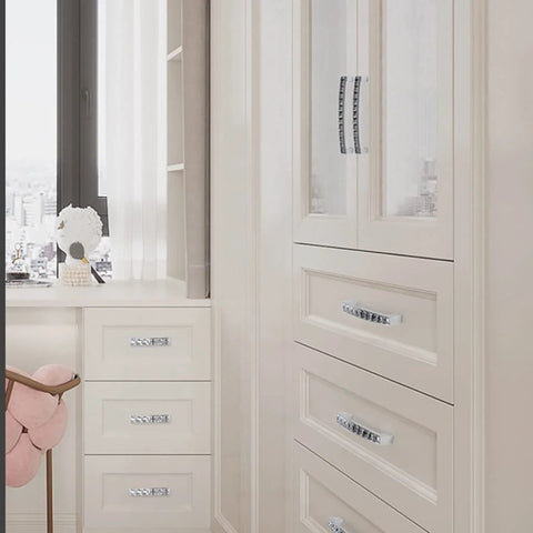 U Shape Crystal Glass Diamond Rhinestone Cabinet Pulls 4 Pack With 2.5 Inch Center Holes installed on white drawers and wardrobe