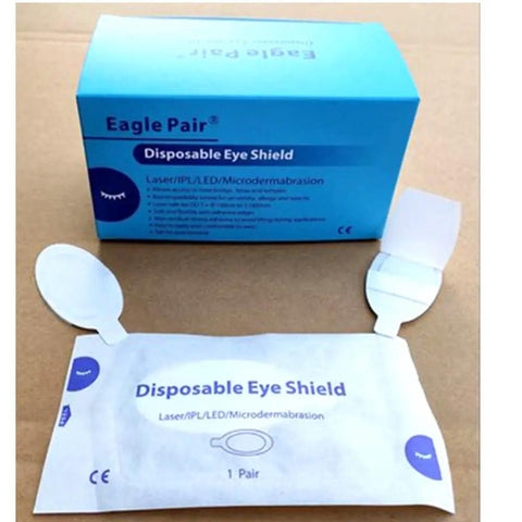 Premium Disposable Laser And Ipl Led Eye Shields Pro Grade Cosmetics Safety Pads Od7 Uv Blocking Heavy Duty Spa Facial Treatments 50 Pairs Black Straight Up Client Protection package with single eye shield opened.