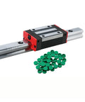 Premium HGR35 Linear Motion Guide Set With Four HGH35CA Flanged Bearing Blocks on aluminum rail with green spacers.