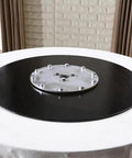 Smooth As Butter Black Tempered Glass Lazy Susan Turntable Built Different 24 inch rotating serving tray on table.