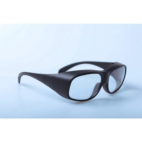Top Shelf Heavy Duty Infrared Laser Safety Glasses Featuring 10600nm Wavelength Coverage With Rock Solid Od6 Plus Optical Density For Co2 Laser Booths Built Tough For Daily Shop Floor Work side angle on blue background.