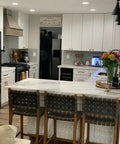 modern kitchen featuring a marble island and white cabinetry with 10 Pack Brushed Brass Cabinet Pulls And Heavy Duty Zinc Alloy Drawer Handles With Top Notch Vintage Gold Finish For Your Kitchen Cupboard And Dresser That Offer Dead Easy Install And Serious Style.