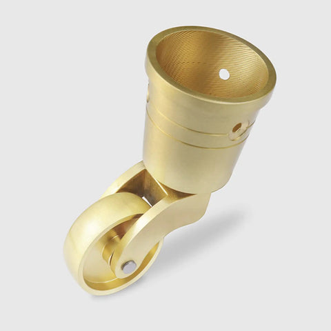 Top Shelf 4 Pack Solid Brass Casters, Hella Durable 360 Degree Swivel Design, showcasing a close-up of a single brass caster wheel.