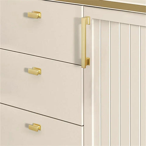 Modern Gold Brushed Cabinet Handles Zinc Alloy Long Drawer Pulls For Kitchen Drawers And Wardrobe Doors With Easy Peasy Mounting Solid Build Rust Resistant Finish on light-colored drawer.