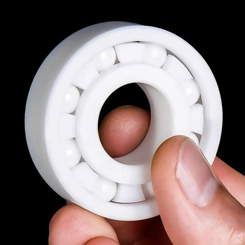 Pro Grade Zirconia Full Ceramic Ball Bearings With Next Level Heat Resistance And Beast Mode Operation For Grind Shop Machines And Hot Rod Builds 6314CE, held in hand.
