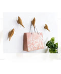 Straight Up Best Bird Shaped Resin Wall Hook With Wood Grain Finish For Coats And Hats Slick Wall Mounted Bedroom Organizer Smooth Edge Design Sweet Home Decor Plus Hassle Free Install with pink bag on wall.