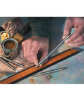 Badass Nail Set Fits 1/32 To 2/32 Inch Brads displayed on a workbench with hands showing precision use for trim carpentry.