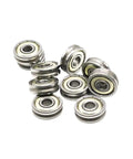 10 Pack Tough As Nails V Groove Pulley Wheels With ABEC 7 Precision Ball Bearings 5X16X5 mm build, polished steel bearings in a stack.