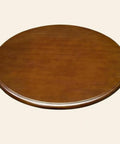 Slick Rolling Wooden Lazy Susan Turning Tray Real Game Changer For Kitchen Counters And Reliable Dining Tables With Silent Bearing Sturdy Round Swivel Serving Platter round wooden surface viewed from above.