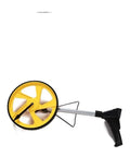 No Sweat Two Pack Foldable Digital Measuring Wheels With Remote Display For Straight Shots And Smooth Curves On Any Job Site Featuring A Rugged Telescopic Pole That Makes Big Builds Effortless, yellow wheel close-up.