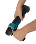Heavy Hitter Brushless Cordless Angle Grinder With Variable Speed And 125 Mm Disc Cutting Action For Battery Powered Diy Projects And Smooth Metal Grind Work Daily held in hand, showing grip and cutting edge detail.