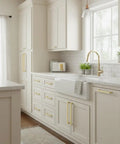 Give Your Home a Chic Glow Up with These Epic Brushed Gold Cabinet Pulls Hardware 10 Pack 5 Inch Handles for Kitchen Cabinets Drawers and Wardrobes Solid Metal Fit in a modern kitchen.