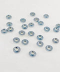 25 Pack Self-Clinching Nuts Press-In Sheet Metal Fasteners Stainless Steel scattered on a white background showing zinc coated surface.