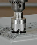 Heavy Duty 3 4 Inch Carbide Hole Cutter Rips Through Metal Sheets Like Hot Butter Cuts Crisp Holes In Stainless Steel Iron Copper Brass Up To 3 16 Thick Shop Grade Power Tool Bit in use drilling through metal.