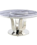 Super Sleek White Marble Round Dining Set With Four Plush Cream Velvet Chairs And No Hassle Lazy Susan Top featuring a polished round marble table with stainless steel base.