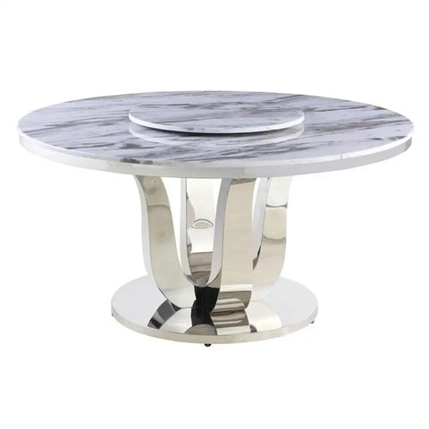 Super Sleek White Marble Round Dining Set With Four Plush Cream Velvet Chairs And No Hassle Lazy Susan Top featuring a polished round marble table with stainless steel base.