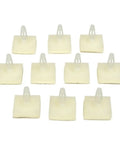 Hella Secure Self Adhesive PCB Snap Fasteners Featuring Slick Flat Head Design Skip Pre Drilling Easy Mounting For Electronics Projects Rock Solid Hold Heavy Duty 100 Pack - Off white M2 nylon fasteners on display.