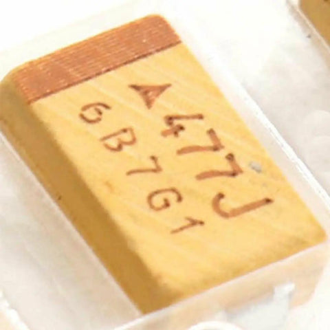 Image of a tantalum capacitor from the Twenty Pack Of Pro Grade Tantalum Capacitors brings serious 470 UF 6.3 Volt juice.