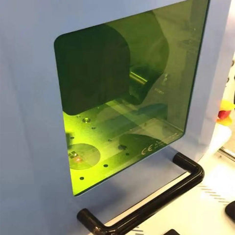 Heavy-Duty Laser Safety Protection Window for 900 to 1070 nm with 40 Percent Transmittance and OD Over 6 for DIR AB6 Class Rating visible in shop equipment.