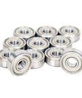 10 Pack Real Deal Deep Groove Ball Bearings Stainless Steel Rubber Sealed Double Shields Radial Support Built Different For Smooth Rolls And Serious Workloads S6010 50X80X16Mm arranged in a pile.