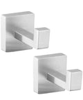 Solid Double Hook Wall Mount For Small Bathrooms Sleek Silver Finish Space Saving Towel Rack With Heavy Duty Grip Easy Wipe Design That Totally Flips Your Messy Vibe Today. Two silver hooks mounted on wall.