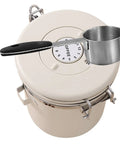 Solid Stainless Steel Coffee Bean Storage Jar Set With Airtight Lid To Keep Your Daily Grind Fresh, top view with measuring scoop.
