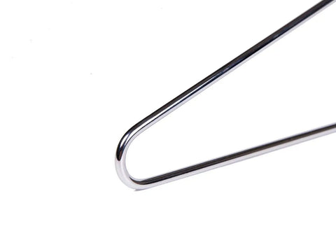 Close-up of a 16 Pack Stainless Steel Wire Hangers Built To Last With Ultra Thick 4mm Metal Hangers Seamless Non Welded Design for heavy duty use.