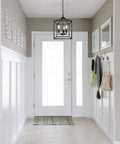 Dope Three Light Industrial Farmhouse Chandelier In Matte Black With Square Cage Pendant in entryway, showcasing rustic style.