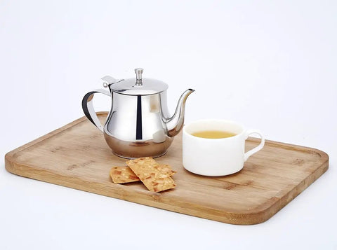 Mini 360Ml Stainless Steel Teapot For Tea And More on wooden tray with cup and biscuits