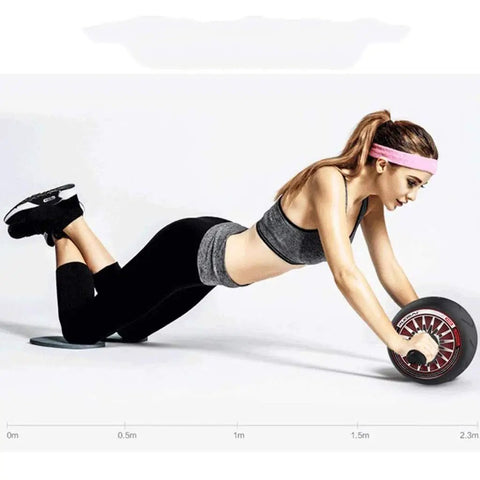 Woman performing core exercises with Heavy Duty Solid Steel Ab Roller Wheel Core Training Equipment Silent Glide Rolling Non Slip Handles.
