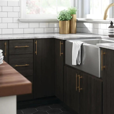 Top Shelf 10 Pack Adjustable Cabinet Handles In Elegant Champagne Bronze Finish on dark kitchen cabinets with farmhouse sink.