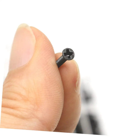 Close-up of black screw from 18 Piece Small Screw Set With Flat Countersunk Head Fasteners For Glasses And Watches Diy Projects