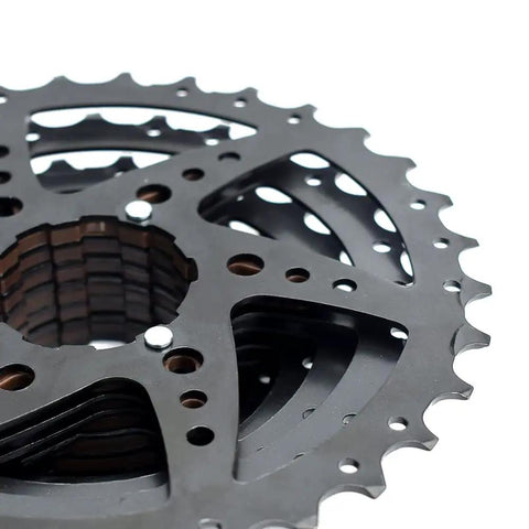 Close-up of 9 Speed Bike Cassette 11-25T 11-32T 11-36T 11-40T for Mountain and Road Bikes, steel nickel plating for Shimano and SRAM.