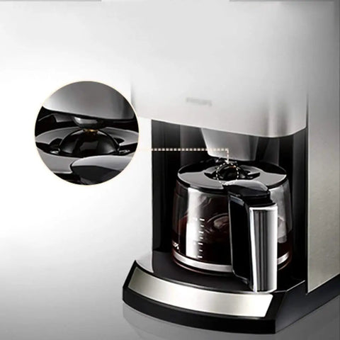Fully Automatic Coffee Machine For Home Or Commercial Use Built Tough With Food Grade Stainless Steel Dual Purpose Drip Espresso Maker Light Gray Countertop Brewer close-up of brewing carafe and lid detail.
