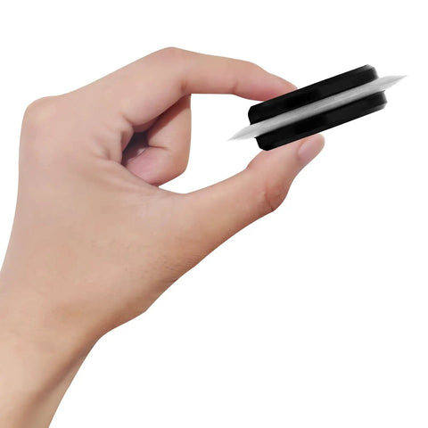 Hand holding an upgraded replacement blade for wire stripping machine made of 65Mn spring steel with two way bearings.