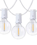 Close-up of three clear globe bulbs from 25Ft LED String Lights With 27 Shatterproof Clear Globe Bulbs Dimmable And Energy Efficient Connectable.