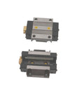 Two CDG65A flange bearings from the Four Piece CDG65 Linear Roller Guide Rail Set With Eight CDG65A Flange Bearings, 108.27 Inch Long (2750mm).