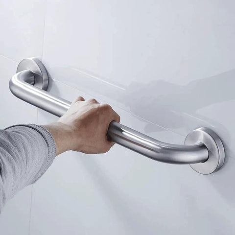 Solid As A Rock Stainless Steel Bathroom Safety Grab Bar With Slick Proof Grip Heavy Duty Support For Showers Tubs And Toilets Handles Over Five Hundred Pounds Two Piece Set held by a hand, showing sleek design and durable material.
