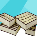 4-Pack Non-Woven Bra Storage Boxes To Sort Your Drawer Drama And Keep Socks Ties Scarves Intact While Absorbing Moisture And Odor So Your Lingerie Game Stays Strong And Your Closet Always Looks Fresh in beige and brown.