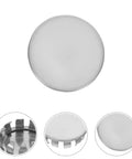Close-up of a round stainless steel knockout plug from the 10 Pack Round Stainless Steel Knockout Plugs For Junction Boxes And Electrical Panels.