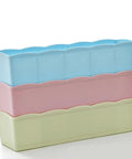 Stackable Plastic Drawer Organizers In Snazzy Pink For Crushing Closet Clutter And Laid Back Home Storage Setup. Three colorful bins.