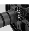 Heavy Duty Ab Roller Featuring Silent Glide Wheels And Grippy Foam Handles Built For Serious Core Sculpting And Casual Home Workout Vibes Without Making A Peep close-up of the stainless steel hub and foam handles