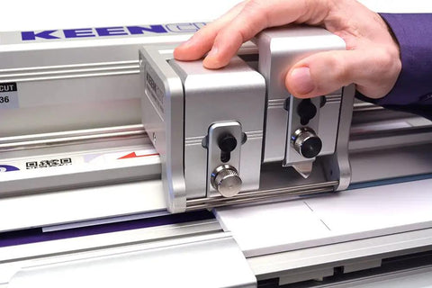 Evolution3 Benchtop Material Cutter Pro Grade Boss Level Quality with 84 Inch Cutting Length, showing double Graphik head in use.
