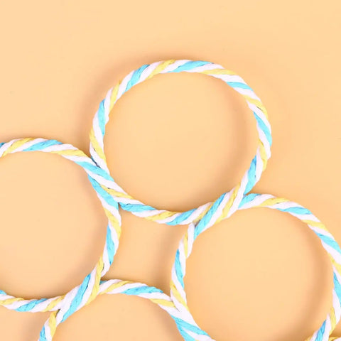 Paper Rattan Scarf Hanger With 12 Foldable Rings For Wardrobe And Closet Organization, colorful twisted rings on a light background.
