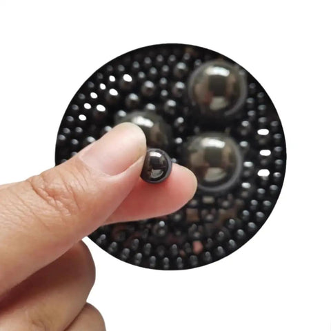 Premium Silicon Nitride Ceramic Ball Bearings Built Tough For Extreme Heat And Heavy Loads At Sixty Three Point Five Millimeters shown in hand.